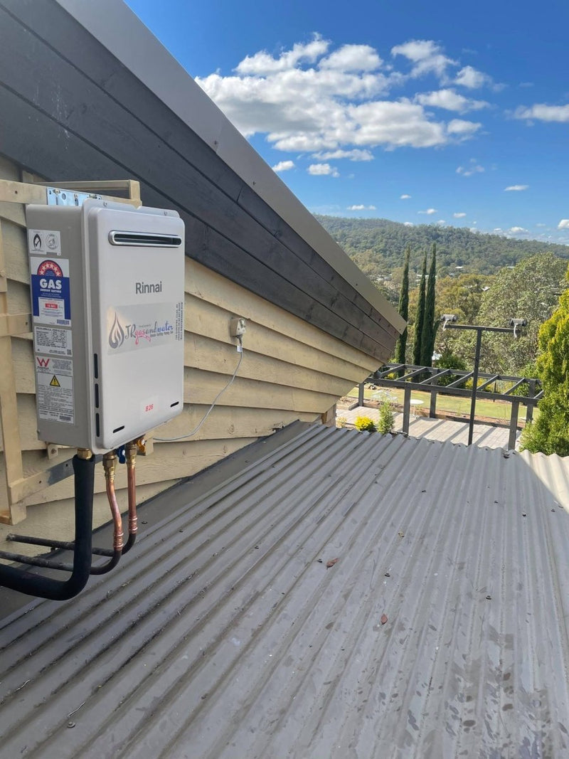 Rinnai B16 installed on the roof of a house | Featured image for Rinnai B16 (REU-A1624WB) + Installation Kit - 50